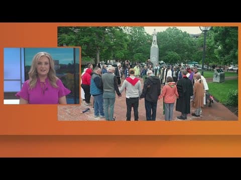 Residents in Boulder gather for prayer after Sunday attack
