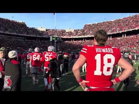 Fight breaks out during Carmen Ohio after Michigan players plant the flag at midfield