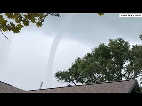 Photos and videos capture waterspout in Galveston; tents, umbrellas and other belongs tossed around