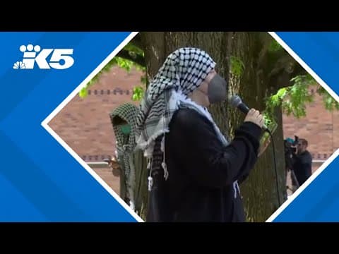 Rallygoers urge support for 21 students suspended after protest at UW