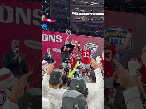 Ohio State head coach Ryan Day hoists the Scovell Trophy after winning the Cotton Bowl 🏆