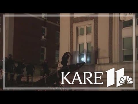 Large numbers of New York City police officers begin entering Columbia University campus