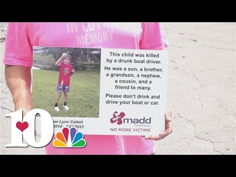 Family and friends of boy killed by boater displaying signs urging people not to drink on the water