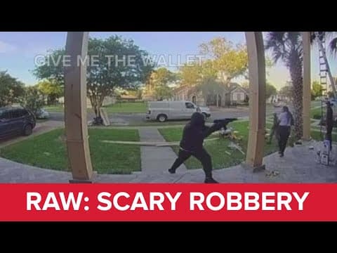 Raw: Doorbell video captures man robbing construction workers outside of New Orleans home