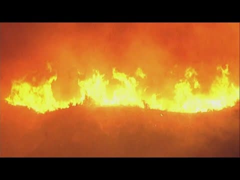 Over 50,000 under evacuation orders or warnings as wildfire imperils homes north of Los Angeles