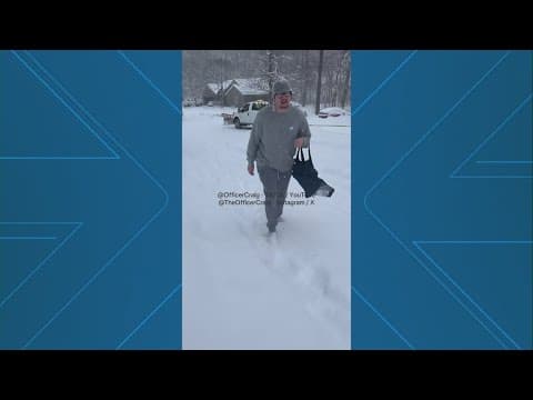 Video of pizza delivery driver walking through snow on closed road goes viral