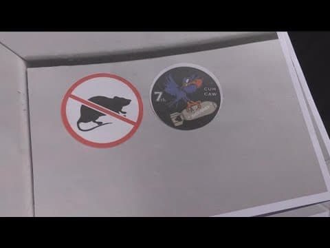 Activists: ‘Blue code’ of silence stickers on SDPD restroom door