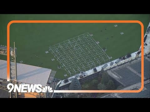 Crews begin stage steup for Paul McCartney at Coors Field