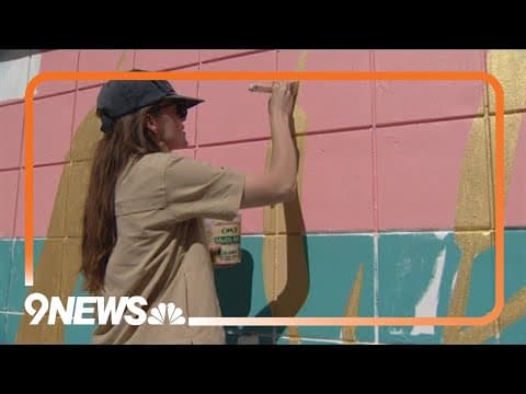 Artist paints mural along Arvada bike path