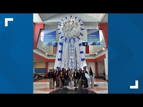 Raw video: Massive mum goes up at Dickinson High School