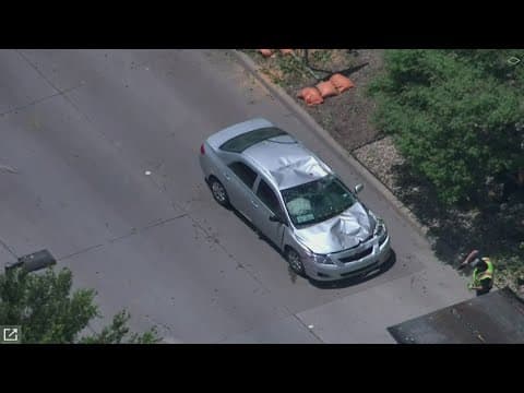 Tree falls onto car in North Texas