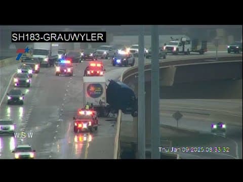 18-wheeler jackknifed on slick North Dallas roads