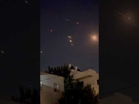 Iran fires dozens of missiles into Israel in a sharp escalation of regional conflict