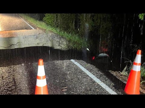 Gaping hole forms on FM2989 in Hunstville area after heavy overnight rain