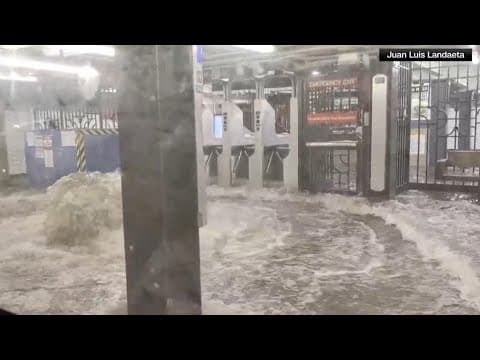 Videos show NYC subway riders trapped in floodwater as storms hit