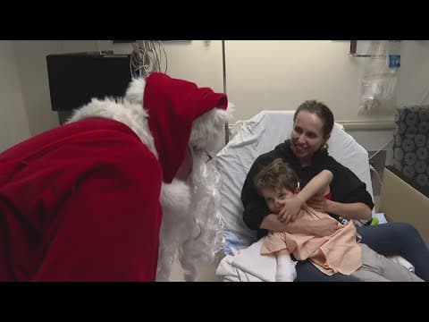 Santa arrives by helicopter at Georgetown University Hospital