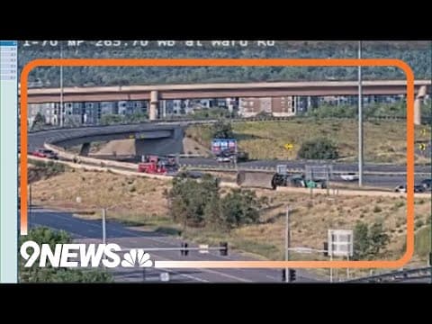 Semi-truck rolls over on I-70 ramp
