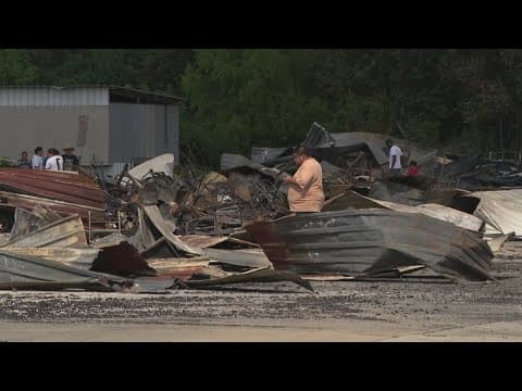 2 firefighters, civilian hurt in flea market fire in north Houston