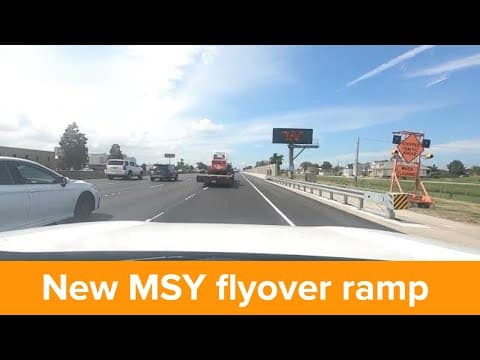 Cars driving on new I-10 west flyover ramp at MSY