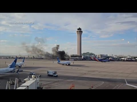 Plane catches fire at Denver International Airport