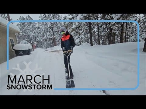 Snowboard tow and jump in deep Colorado snow
