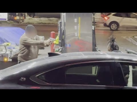 Man holds woman at gunpoint at northeast Indy gas station