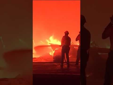 Hurricane-force winds fuel multiple fires raging in Southern California