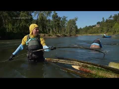 A year after Helene, crews still pull tons of debris from North Carolina waterways