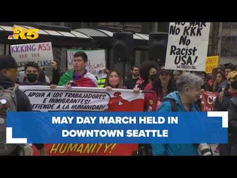 People push for the rights of immigrants and workers during May Day march