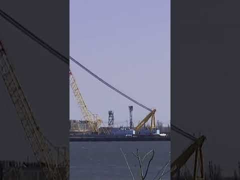 Crews begin removing first pieces of collapsed Baltimore bridge