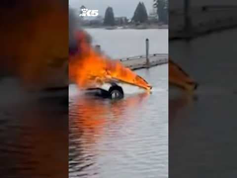 1 person dead after flaming car drives into lake