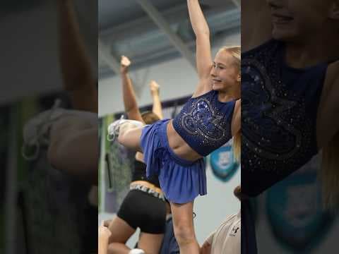 Cheerleading gym hosts clinics for dads to stunt with their daughters