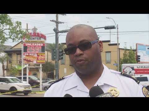 Woman killed as car shot up with child in back seat