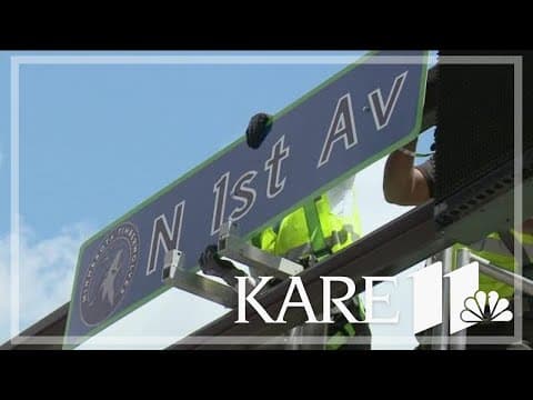 City officials put up temporary Wolves street signs in downtown Minneapolis