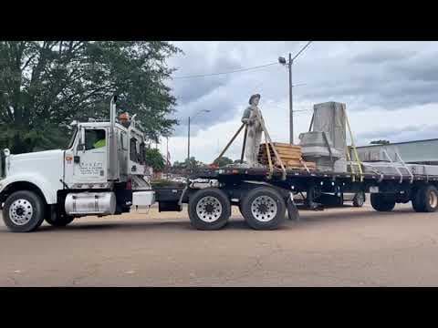A Confederate monument is moved in Mississippi, after four years of being covered by tarps