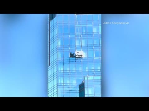 Window washers rescued after rigging swings out of control outside NYC high-rise