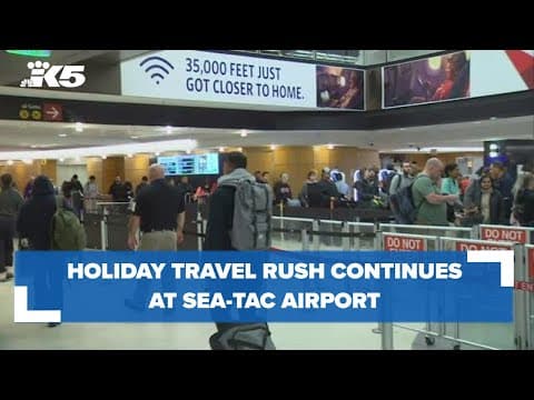 Holiday travel rush continues at Sea-Tac