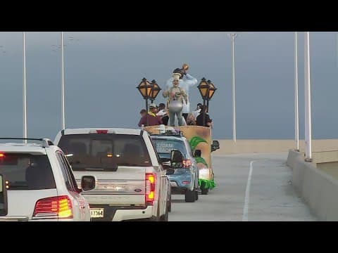 Of course New Orleans uses a Mardi Gras float to open a new section of road