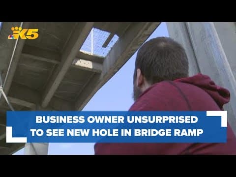 Business owner under West Seattle Bridge ramp not surprised to see hole in the concrete