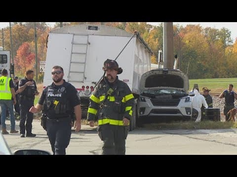 One killed in crash between SUV and semi truck