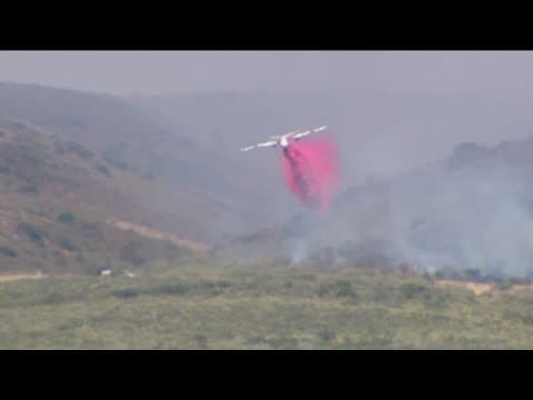 Fire burning at MCAS Miramar near San Diego freeways