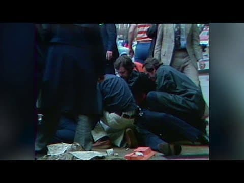 File footage: A chaotic scene following the 1981 assassination attempt on President Ronald Reagan