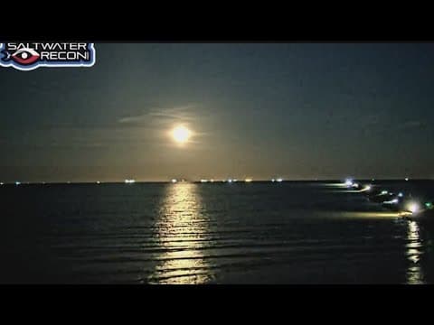 First of two supermoons this month lights up the sky