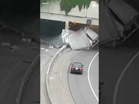 WATCH: Truck carrying ammunition splits apart in crash at Minneapolis’ Lowry Hill tunnel.