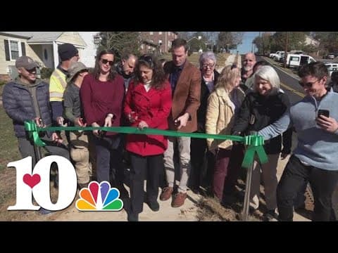 Knoxville leaders cut ribbon on new Lancaster Drive sidewalk, showing off other planned improvements