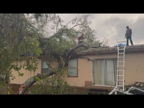 Tree crashes through home in Liberty County, Texas, during tornado warning