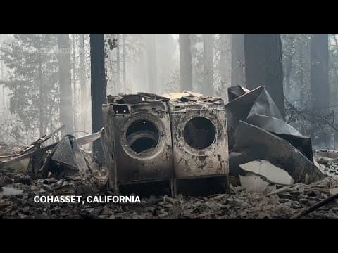 Devastation and smoke rise from the ashes of California wildfires
