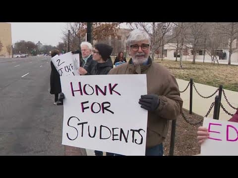 Protesters hold 'honk-a-thon' outside Department of Education to oppose cuts