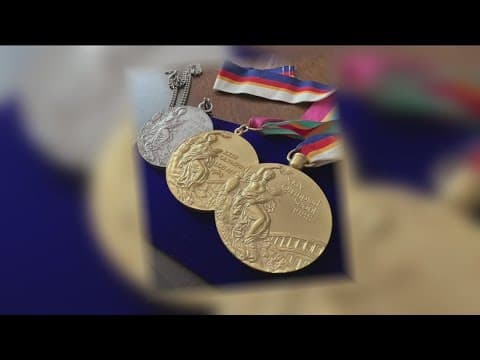 Diving legend Greg Louganis to auction off medals to help HIV center