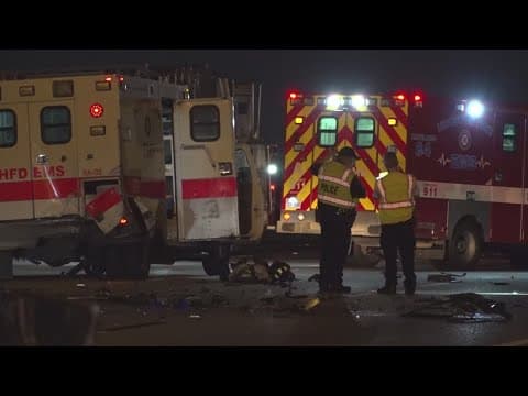 Man dies after crashing into ambulance assisting other driver, HPD says